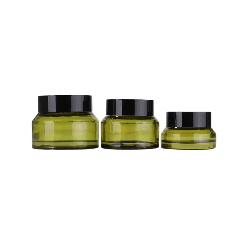 กระปุกแก้วสีเขียวมะกอก 3 ขนาด พร้อมฝาสีดำ วางเรียงขนาด