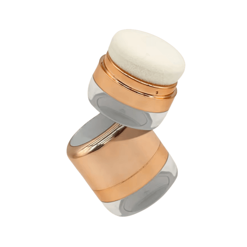 กระปุกบรรจุภัณฑ์เครื่องสำอางทรงกระบอกเตี้ย สีโรสโกลด์ผิวเงา ฐานใส พร้อมหัวฟองน้ำกลมด้านบน ดีไซน์พรีเมียม เหมาะสำหรับผลิตภัณฑ์รองพื้น คุชชั่น